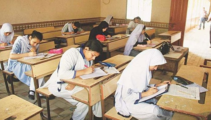 A representational image showing students appearing in an exam. — Online/File