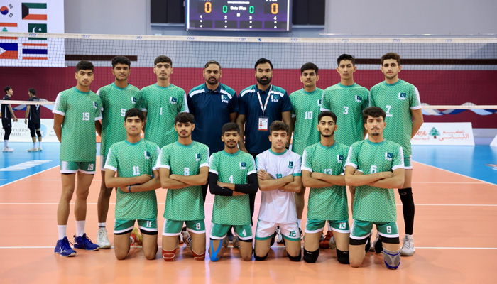 Pakistan volleyball team players and officials pose for a picture during the 15th Asian Mens U18 Volleyball Championship in Bahrain. — Reporter