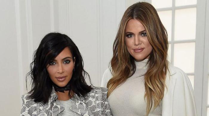 Khloé Kardashian pokes at Kim Kardashian over her dress