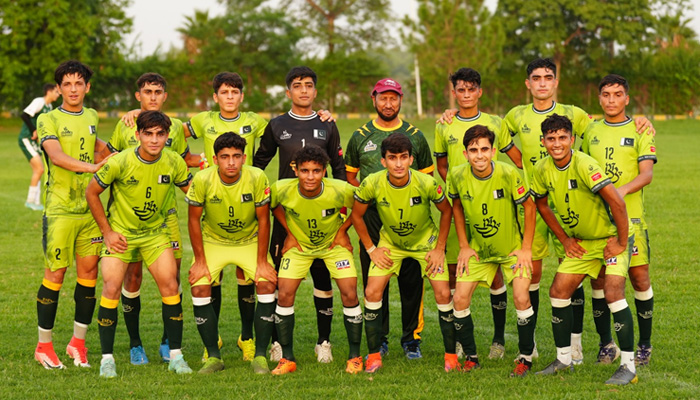 Players of Pakistans U17 street child football team, playing under the name of Muslim Hands FC, in Norway Cup 2024 in this group photo. — Reporter