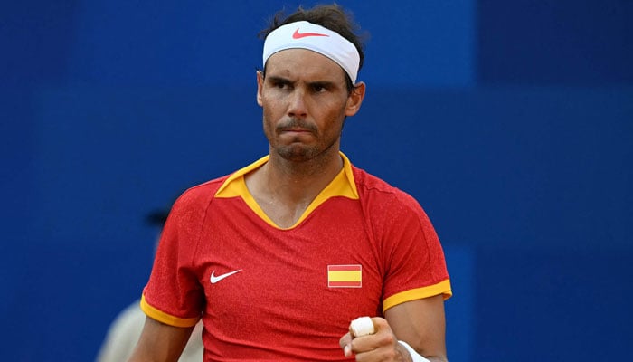 Spains Rafael Nadal playing with Spain’s Carlos Alcaraz reacts while playing Netherlands’ Tallon Griekspoor and Netherlands’ Wesley Koolhof during their men´s doubles second round tennis match on Court Suzanne-Lenglen at the Roland-Garros Stadium during the Paris 2024 Olympic Games, in Paris on July 30, 2024. — AFP