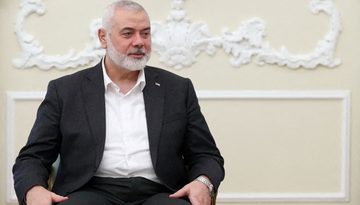 Palestinian group Hamas top leader, Ismail Haniyeh meets with Iranian President Ebrahim Raisi (not pictured) in Tehran, Iran March 27, 2024. — Reuters