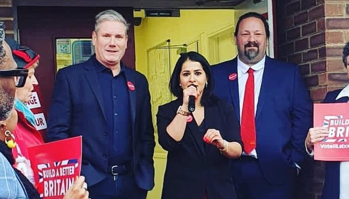 British-Pakistani Labour MP Naushabah Khan (centre) along side Labour Party as Prime Minister Sir Keir Starmer (left) during an event in this undated image.