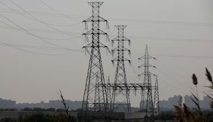 A power transmission tower in Karachi on January 24, 2023. — Reuters