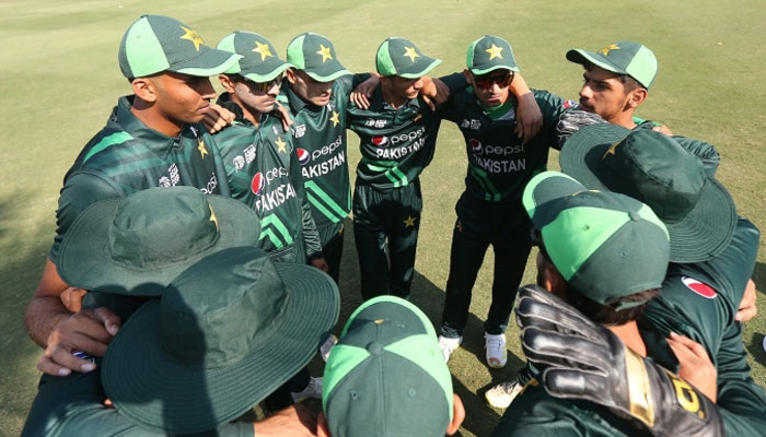 Pakistan Under-19 players discussing game plan before a match. — PCB/File