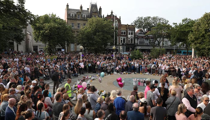 People attend a vigil for the victims of the knife attack in Southport, Britain, July 30, 2024. — Reuters