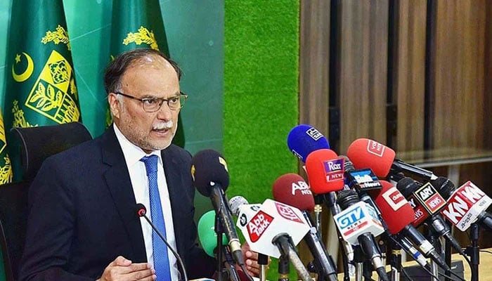 Federal Minister for Planning, Development and Special Initiatives, Ahsan Iqbal addressing a press conference. — APP/File