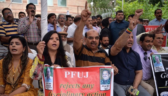 Pakistan Federal Union of Journalists (PFUJ) members participate in a demonstration on World Press Freedom Day in Islamabad on May 3, 2017. — AFP