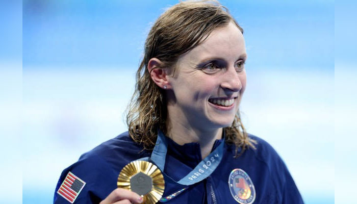 US swim star Katie Ledecky shows her medal. — Geo News/reporter