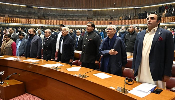 (Right to left) PPP Chairman Bilawal Bhutto Zardari, co-chairman Asif Ali Zardari, Raja Pervaiz Ashraf, Khawaja Asif, PM Shehbaz Sharif, PML-N President Nawaz Sharif stand for the national anthem at National Assembly in this undated photo. — Facebook/@PervezAshrafPPP