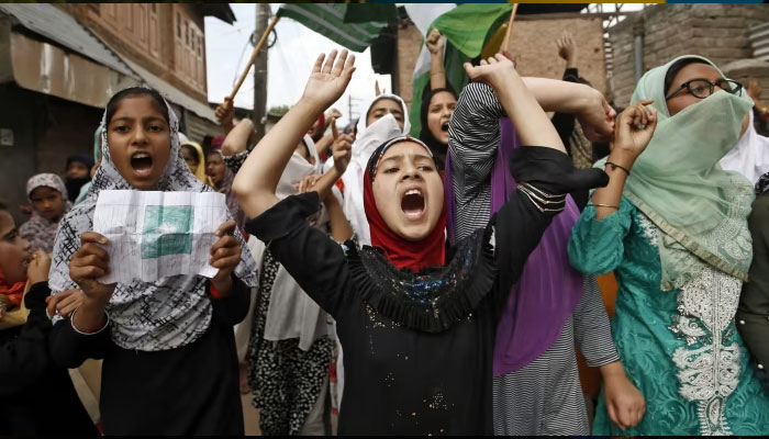 Kashmiris shout slogans during a protest after the Friday prayers in Illegally Occupied Jammu & Kashmir on September 20. — Reuters