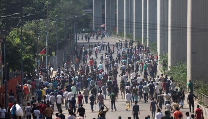 Protesters clash with police and government supporters after an anti-quota protester demanded the resignation of Bangladeshi Prime Minister Sheikh Hasina at Bangla Motor area in Dhaka, Bangladesh, August 4, 2024. —Reuters