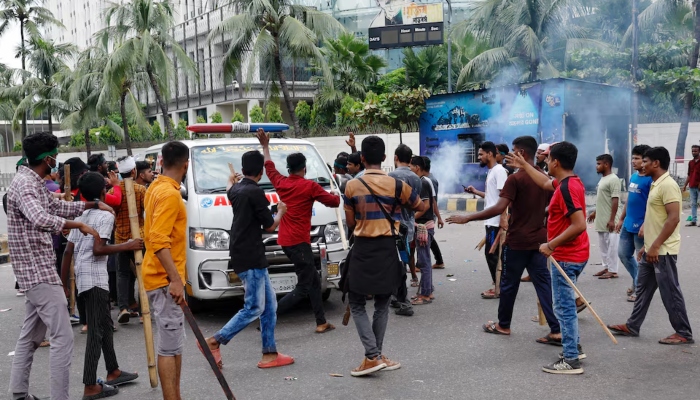 Demonstrators stop an ambulance to check whether there are any patients inside before allowing it to leave during a protest demanding the stepping down of Bangladeshi Prime Minister Sheikh Hasina, in Dhaka, Bangladesh, on August 4, 2024. —Reuters