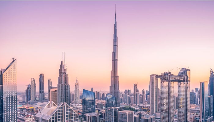 A skyline of Dubai, a dynamic city in the United Arab Emirates. — Unsplash