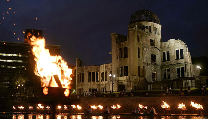 Bonfires light up on the Motoyasu River in front of the gutted Atomic Bomb Dome ahead of the 79th anniversary of Atomic Bomb Day in Hiroshima, western Japan. — Reuters/File