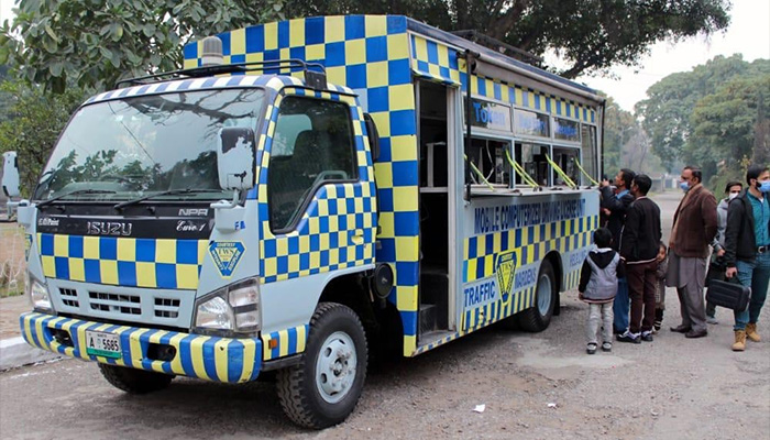 A mobile van of City Traffic Police Peshawar facilitates the citizens from Christian community outside a church to get learners driving licences, Peshawar Cantt, December 25, 2020. — Facebook/@CityTrafficPolicePeshawar