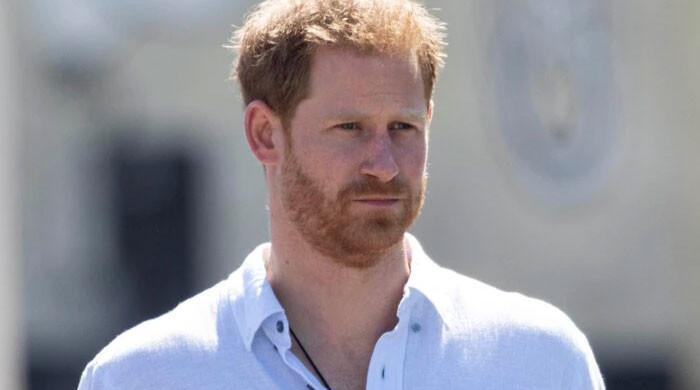 Prince Harry signs his years away to a broker