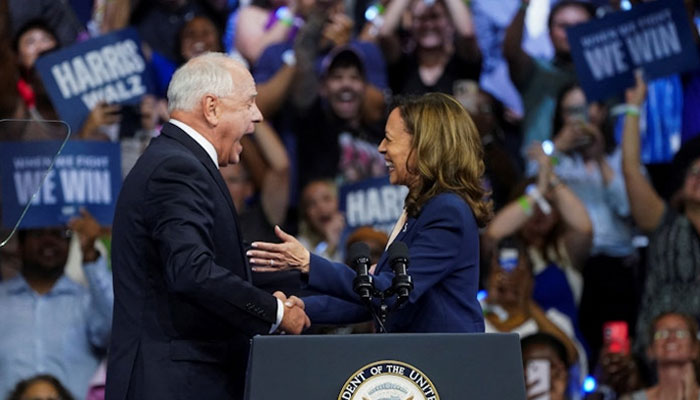 US Vice President and Democratic presidential candidate Kamala Harris and her newly chosen vice presidential running mate Minnesota Governor Tim Walz react during a campaign rally in Philadelphia, Pennsylvania, US, August 6, 2024. — Reuters