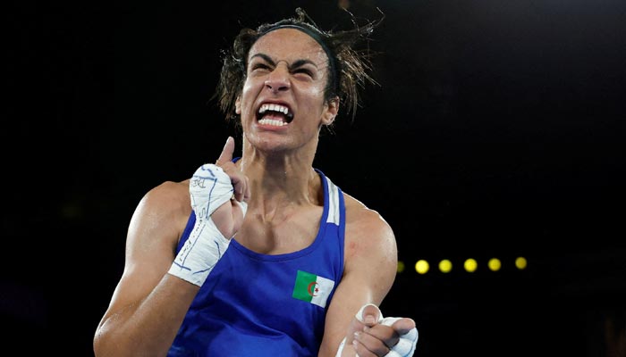 Imane Khelif of Algeria reacts after winning her fight against Janjaem Suwannapheng of Thailand on August 6, 2024. — Reuters