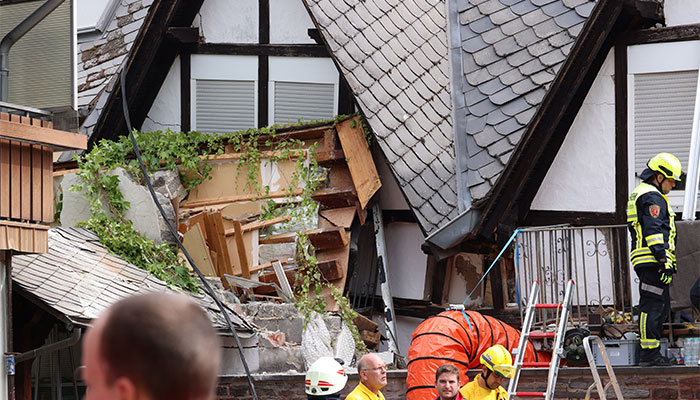 Rescue operations underway after Reichsschenke Zum Ritter Goetz, a hotel in Germany, partially collapsed overnight near the banks of Germanys river Moselle in Kroev, Germany on August 7, 2024. — Reuters