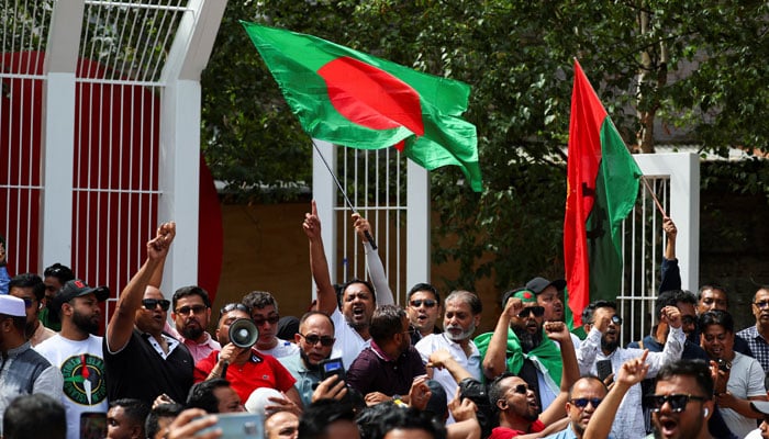 People from the British Bangladeshi community react following the resignation of Bangladeshi Prime Minister Sheikh Hasina, in a park in East London, Britain, August 5, 2024. — Reuters