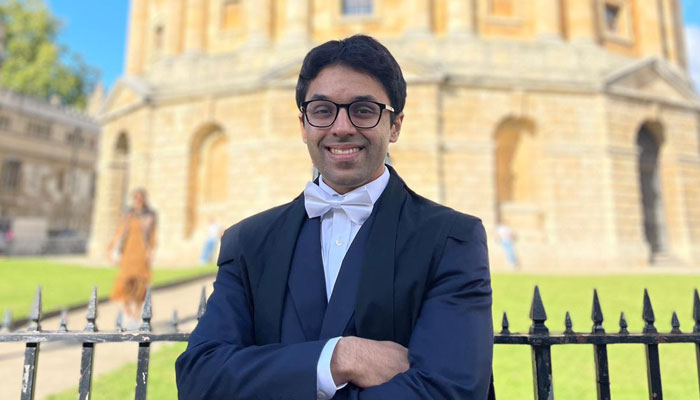 University of Oxford Student Raza Nazar gestures for a photograph. — Reporter/File