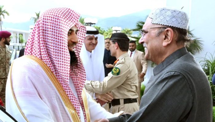 Imam of Masjid Al-Nabawi Dr Salah bin Mohammad M Al-Budair (L) and President of Pakistan Asif Ali Zardari greeting each other in Islamabad, Pakistan on August 8, 2024. — APP