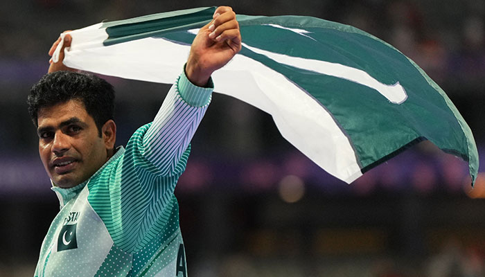 Arshad Nadeem of Pakistan celebrates winning gold and setting a new Olympic record in Saint-Denis, France on August 08, 2024. — Reuters