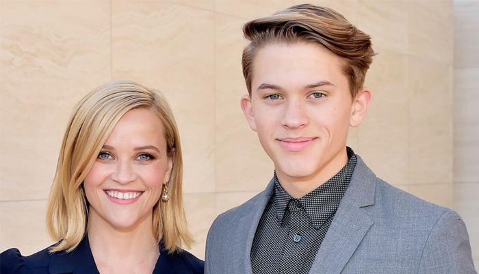 Reese Witherspoon walks down the red carpet with her son Deacon Phillippe