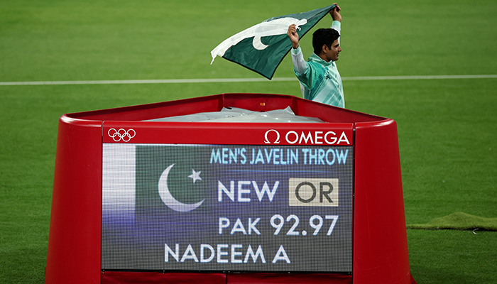 Paris 2024 Olympics - Athletics - Mens Javelin Throw Final - Stade de France, Saint-Denis, France - August 08, 2024. Arshad Nadeem of Pakistan celebrates after winning gold and a new olympic record. — Reuters