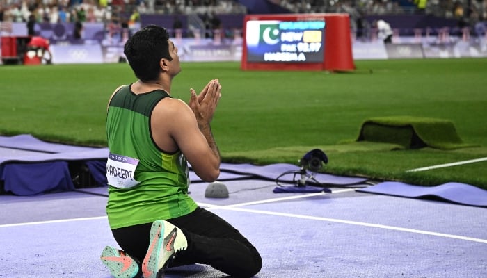 Pakistans javelin thrower Arshad Nadeem reacts as he wins the mens javelin throw final of the athletics event at the Paris 2024 Olympic Games at Stade de France in Saint-Denis, Paris, on August 8, 2024. —AFP