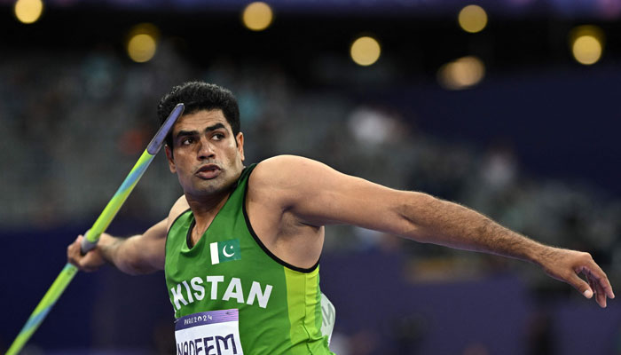 Arshad Nadeem is photographed during the mens javelin throw final of the athletics event at the Paris 2024 Olympic Games at Stade de France in Saint-Denis, north of Paris, on August 8, 2024. — AFP