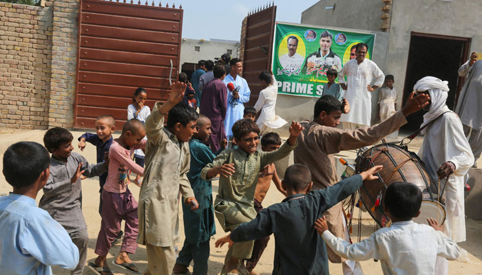 Javelin gold-medallist Arshad Nadeems house is pictured as villagers gather to celebrate in Mian Channu on August 9, 2024. — AFP