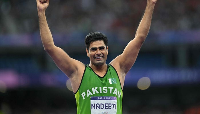 Pakistans Arshad Nadeem reacts as he competes in the mens javelin throw final of the athletics event at the Paris 2024 Olympic Games at Stade de France in Saint-Denis, north of Paris, on August 8, 2024. — AFP