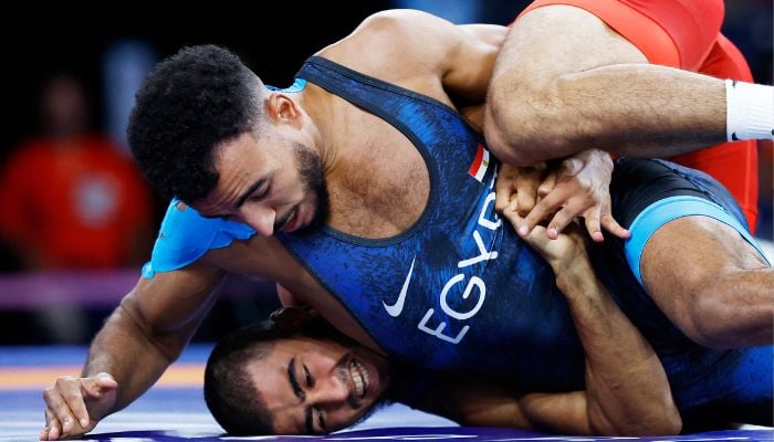 Mohamed Elsayed of Egypt pins down Hasrat Jafarov of Azerbaijan during the Paris Olympics 2024 at the Champ de Mars Arena, Paris, France on August 7, 2024. — Reuters