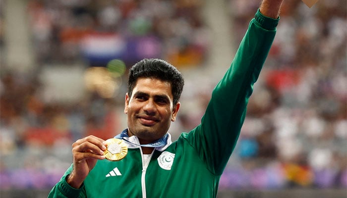 Gold medalist Arshad Nadeem of Pakistan celebrates with his medal on the podium at Mens Javelin Throw Victory Ceremony in the Stade de France, Saint-Denis, France on August 09, 2024. — Reuters