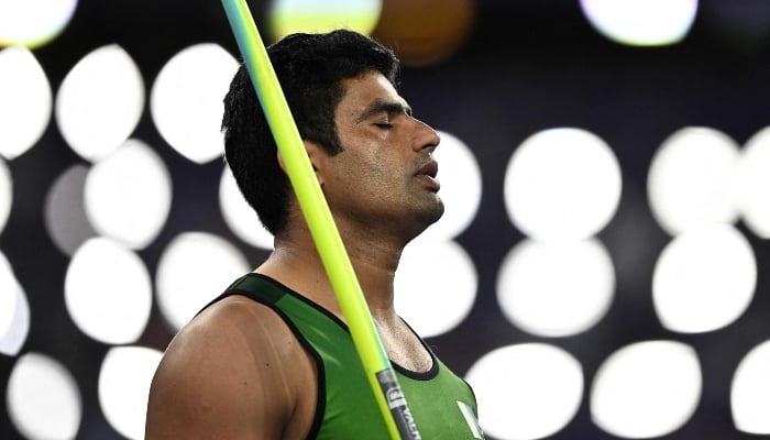 Pakistans Arshad Nadeem reacts as he competes in the mens javelin throw final of the athletics event at the Paris 2024 Olympic Games at Stade de France in Saint-Denis, Paris, on August 8, 2024. —AFP