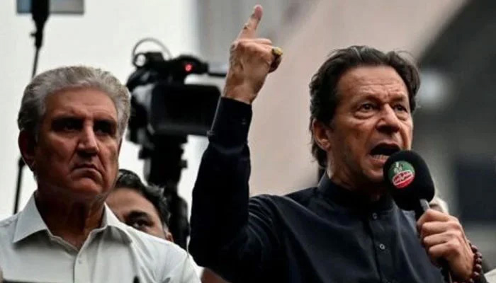 PTI founder Imran Khan (right) and Vice Chairman Shah Mahmood Qureshi. — AFP/File