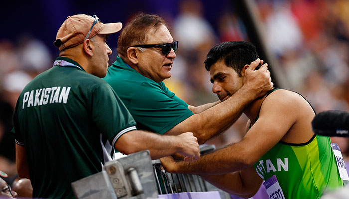 Arshad Nadeem celebrates after setting a new Olympic record in the mens javelin throw event at Stade de France, Saint-Denis, France on August 08, 2024. — Reuters