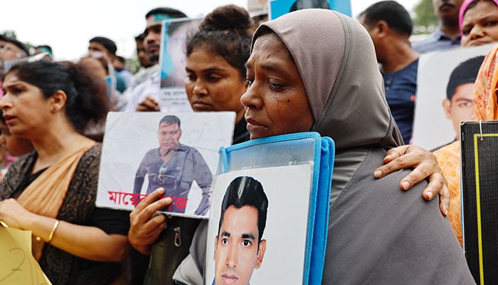 Relatives of the people who disappeared during the reign of Awami League, mourn as they demand justice at the Shaheed Minar, in Dhaka, Bangladesh, August 11, 2024. — Reuters