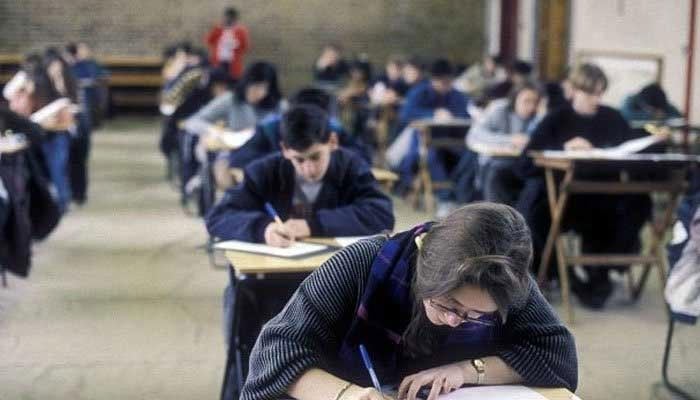 Cambridge students can be seen taking exams. — Online/File