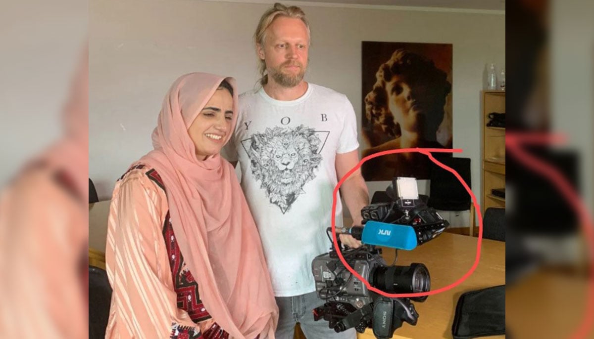 The picture shows the NRK logo on the camera, which confirms the picture was snapped after a media interview.