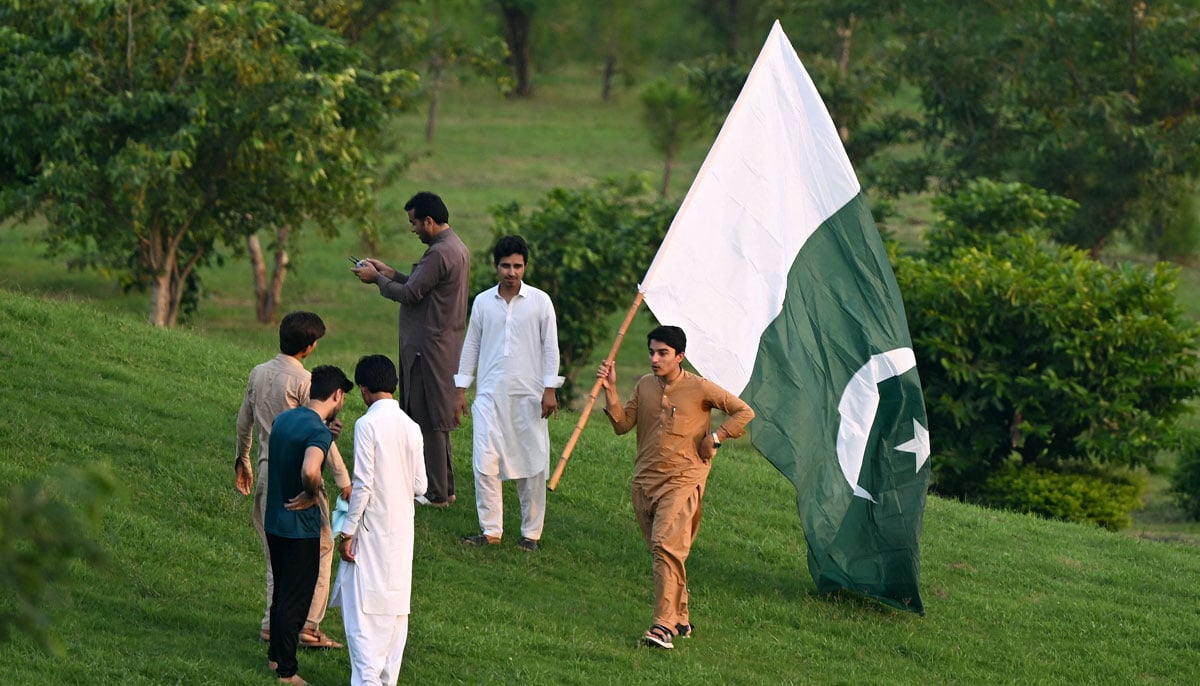 Youth gather at a park to celebrate ahead of Pakistan´s Independence Day in Islamabad on August 13, 2024. — AFP