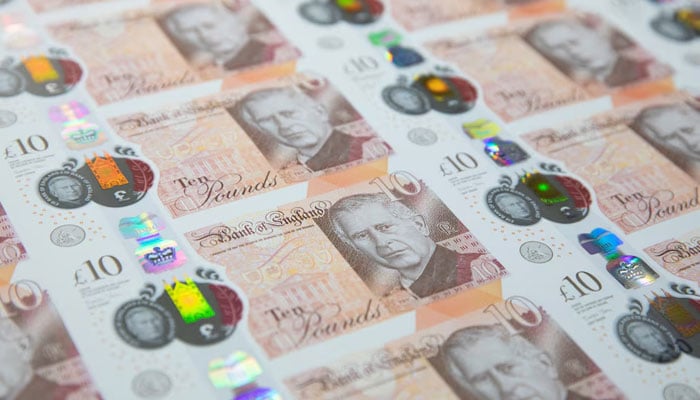 The production of the new King Charles III £10 note by the Bank of England is seen in this undated handout picture. — Reuters/File