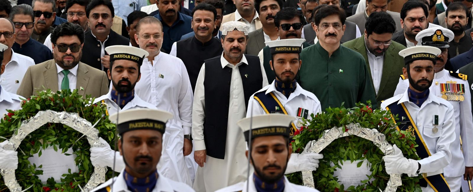 Sindh government officials marching towards the mausoleum of Quaid-e-Azam Mohammad Ali Jinnah to place wreaths during the Independence Day celebrations on August 14, 2024 in Karachi, Sindh, Pakistan. — AFP