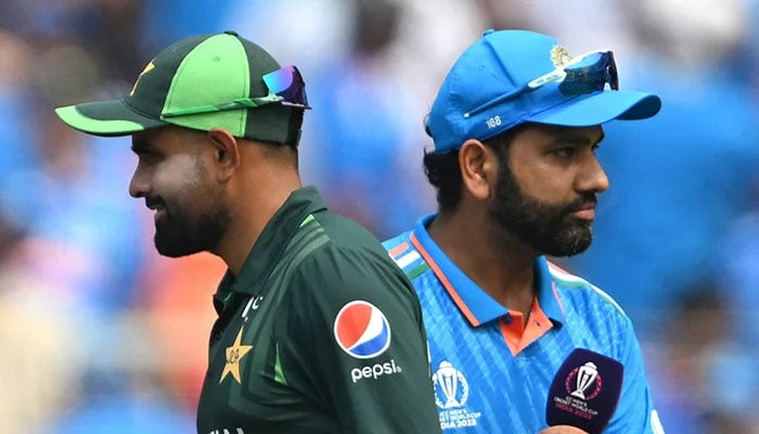 Indian captain Rohit Sharma and Pakistani captain Babar Azam spotted together during a cricket match. — AFP/File