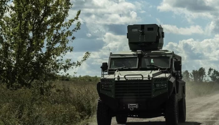 Ukrainian servicemen ride a military vehicle, amid Russia’s attack on Ukraine, near the Russian border in Sumy region, Ukraine August 12, 2024. —Reuters