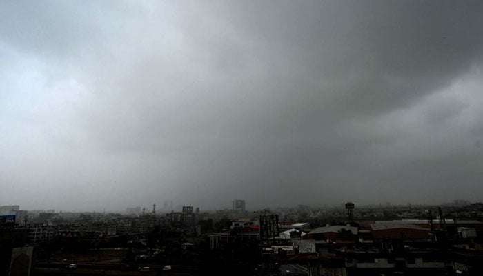 A view of the dark, cloudy sky during the monsoon rainy season in Karachi on August 6, 2024. — APP