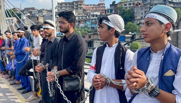 Kashmiri demonstrators protest the abrogation of the special status of Jammu and Kashmir by the Indian government on its fifth anniversary, at Muzaffarabad, capital of Azad Jammu and Kashmir on August 5, 2024. —AFP