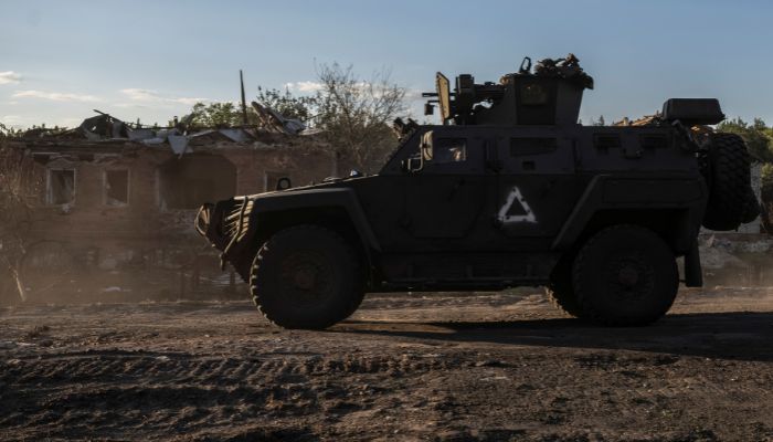 Ukrainian servicemen ride a military vehicle, amid Russias attack on Ukraine, near the Russian border in Sumy region, Ukraine on August 14, 2024. — Reuters